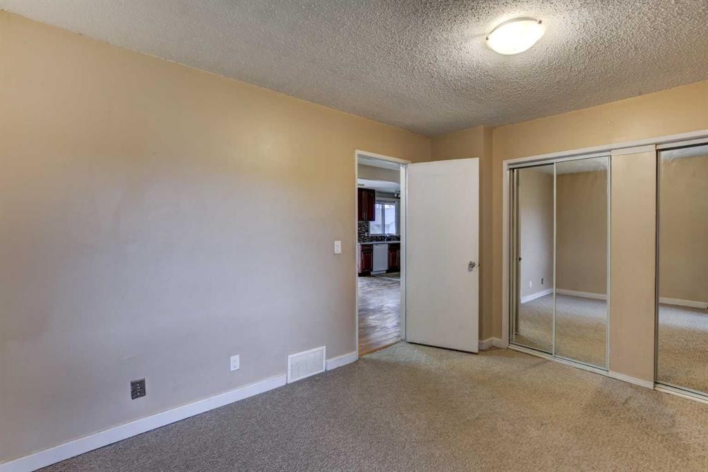 1163 Falworth Road Ne, Calgary, AB - Indoor Photo Showing Other Room