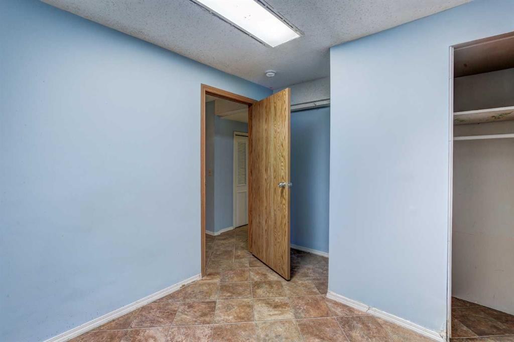 1163 Falworth Road Ne, Calgary, AB - Indoor Photo Showing Other Room