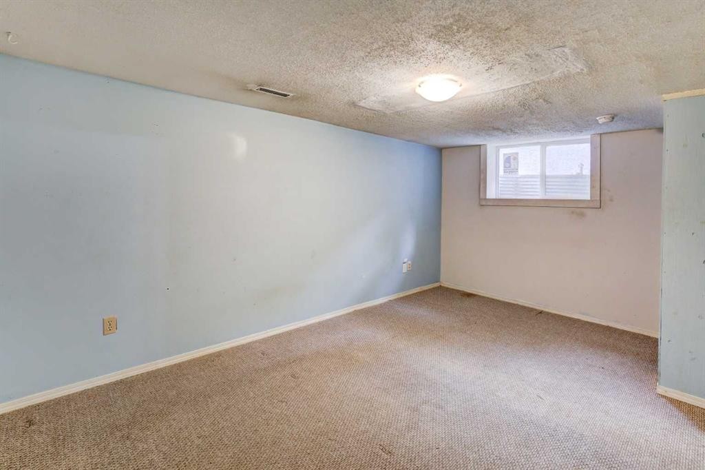 1163 Falworth Road Ne, Calgary, AB - Indoor Photo Showing Other Room