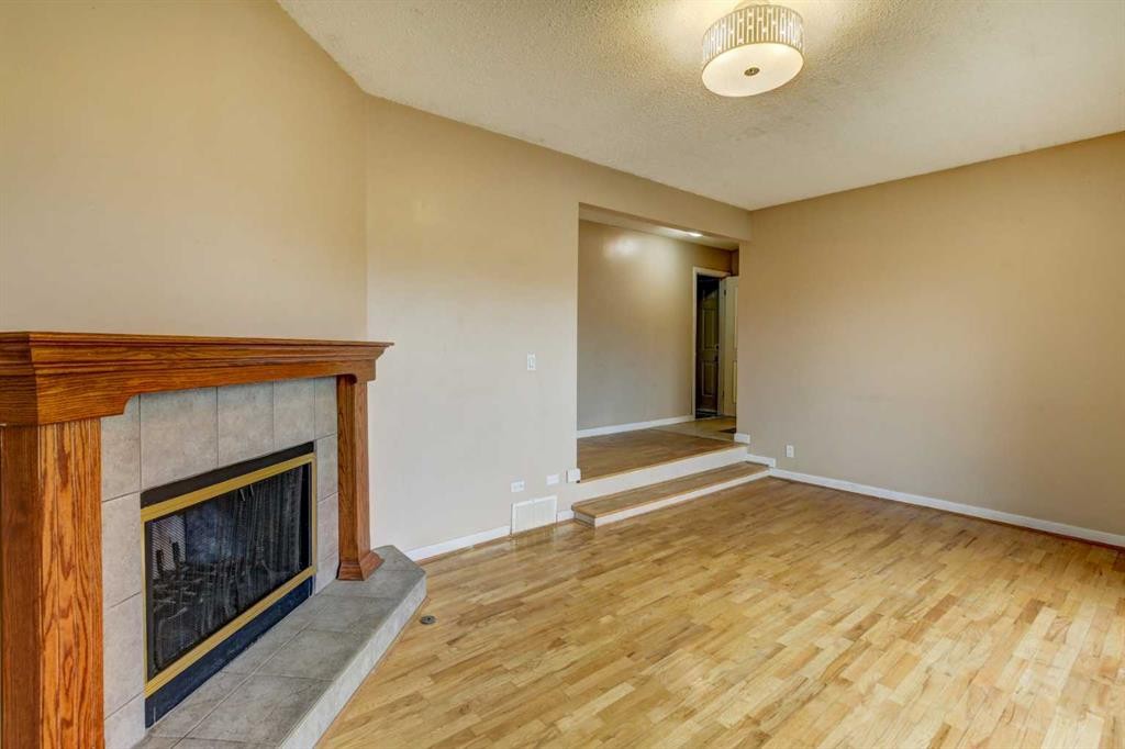 1163 Falworth Road Ne, Calgary, AB - Indoor With Fireplace