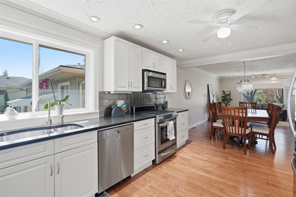 1126 Child Avenue Ne, Calgary, AB - Indoor Photo Showing Kitchen With Stainless Steel Kitchen With Double Sink