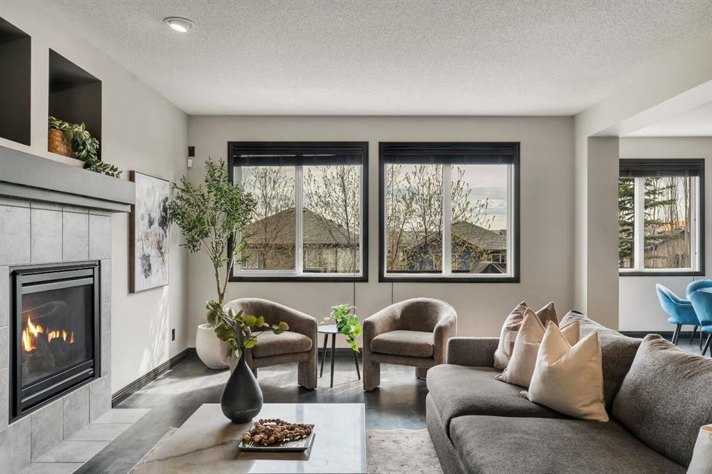 55 Evanspark Circle Nw, Calgary, AB - Indoor Photo Showing Living Room With Fireplace