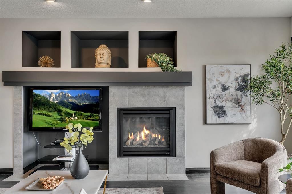 55 Evanspark Circle Nw, Calgary, AB - Indoor Photo Showing Living Room With Fireplace