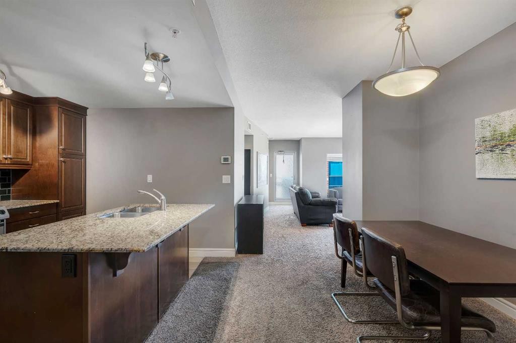 2402-910 5 Avenue Sw, Calgary, AB - Indoor Photo Showing Kitchen With Double Sink