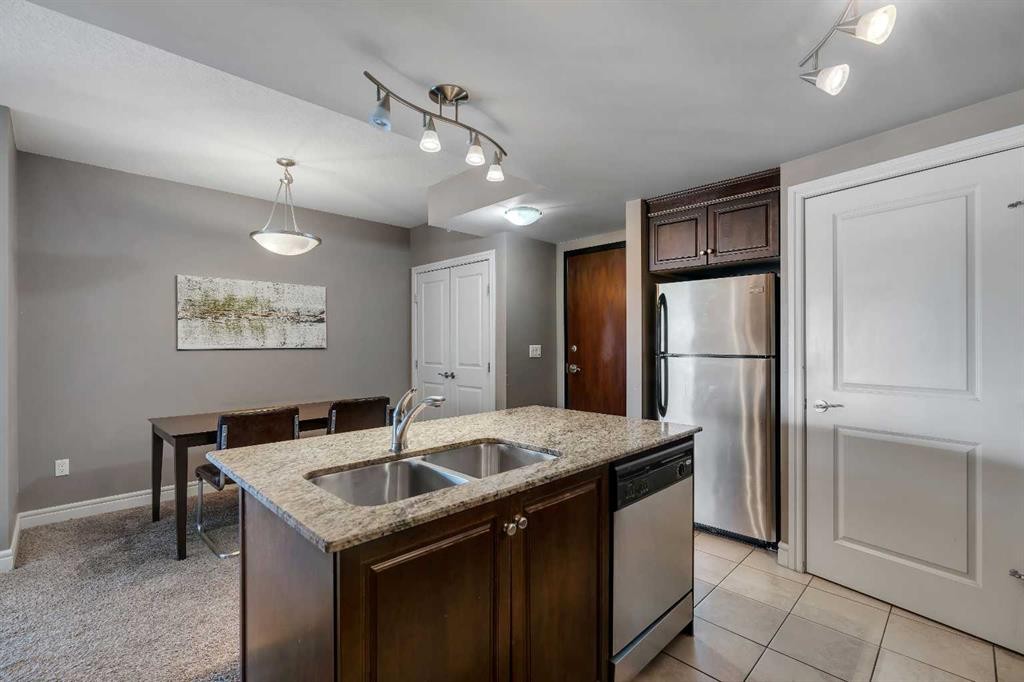 2402-910 5 Avenue Sw, Calgary, AB - Indoor Photo Showing Kitchen With Double Sink