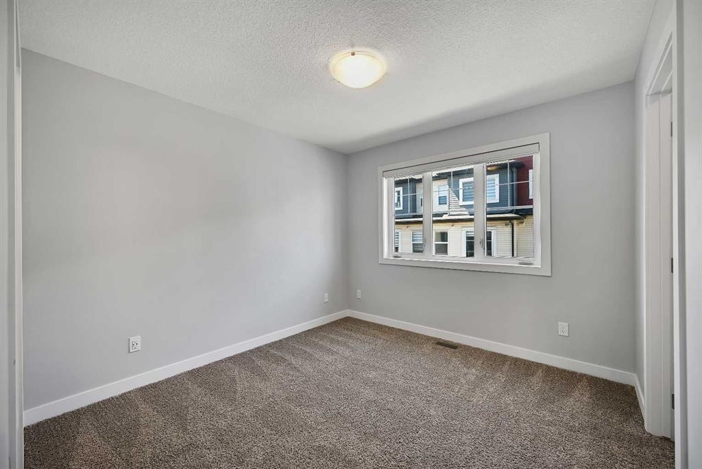 1132 Sage Hill Grove Nw, Calgary, AB - Indoor Photo Showing Other Room