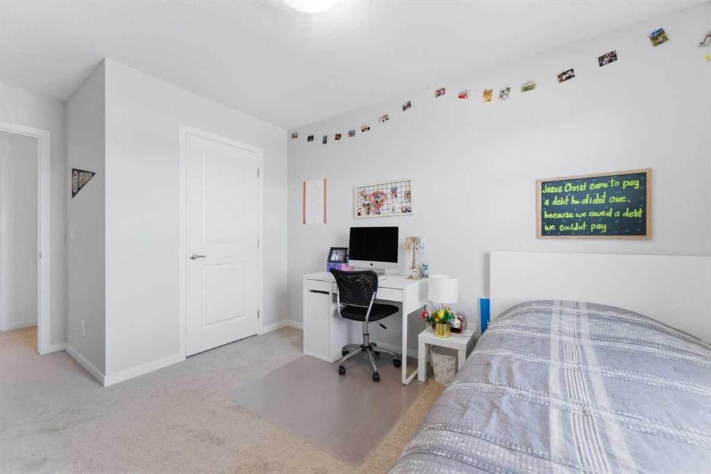 912 Seton Circle Se, Calgary, AB - Indoor Photo Showing Bedroom