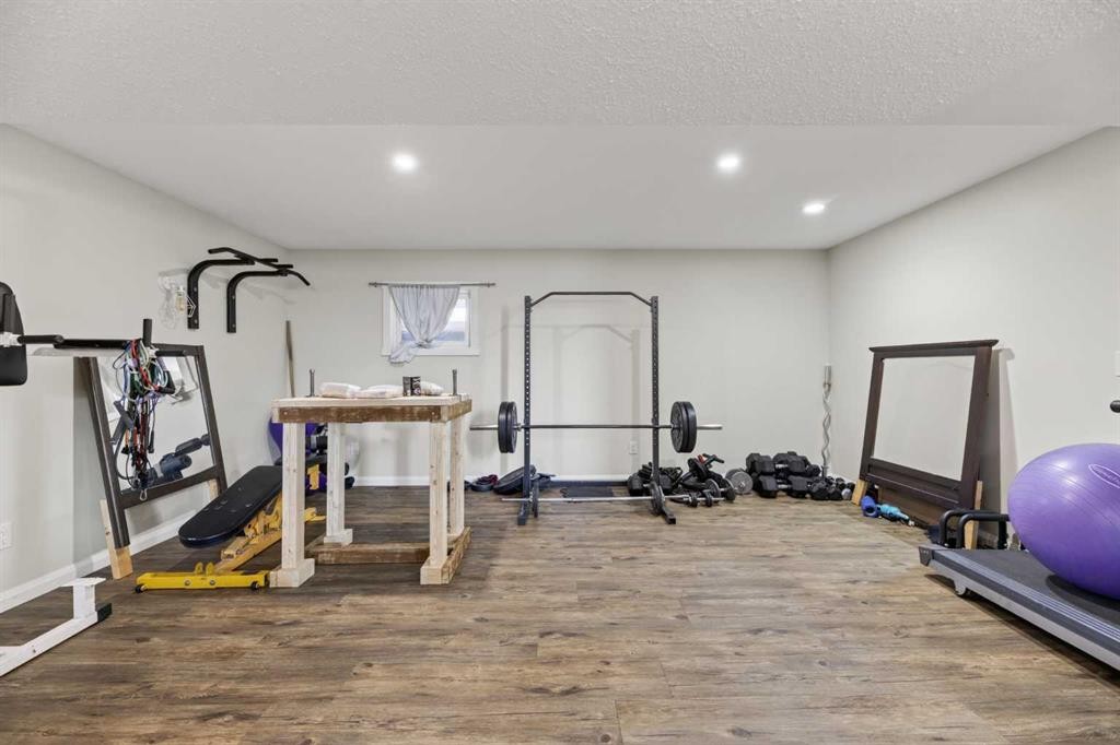 5218 Silverpark Close, Olds, AB - Indoor Photo Showing Gym Room