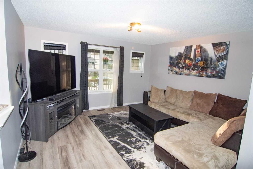 48 Skyview Ranch Lane Ne, Calgary, AB - Indoor Photo Showing Living Room With Fireplace
