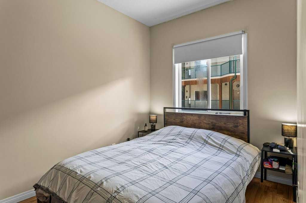 211-176 Kananaskis Way, Canmore, AB - Indoor Photo Showing Bedroom