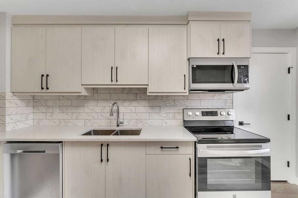 853 Northmount Drive Nw, Calgary, AB - Indoor Photo Showing Kitchen With Double Sink