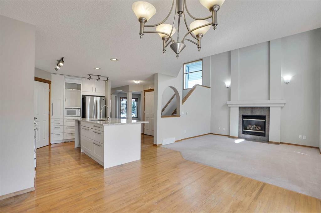 50 Cranfield Crescent Se, Calgary, AB - Indoor With Fireplace