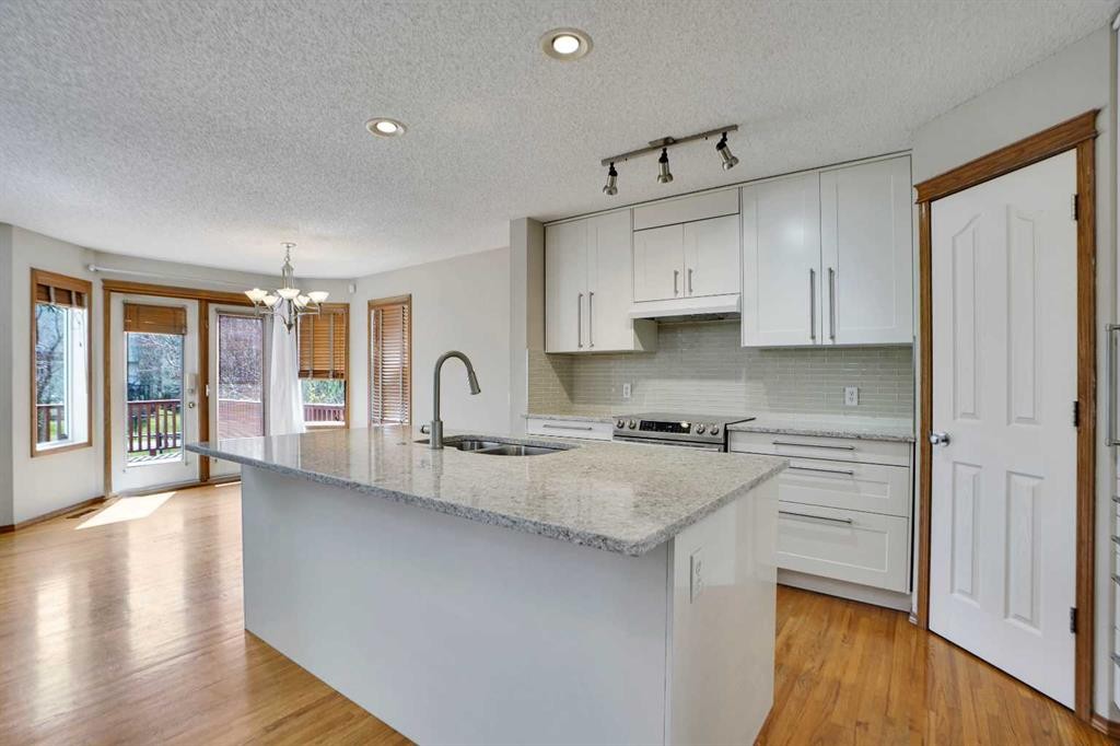 50 Cranfield Crescent Se, Calgary, AB - Indoor Photo Showing Kitchen With Double Sink With Upgraded Kitchen