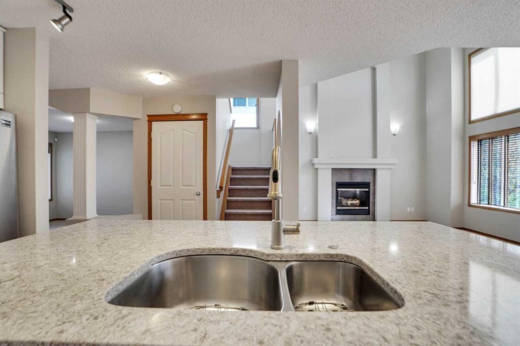 50 Cranfield Crescent Se, Calgary, AB - Indoor Photo Showing Kitchen With Double Sink