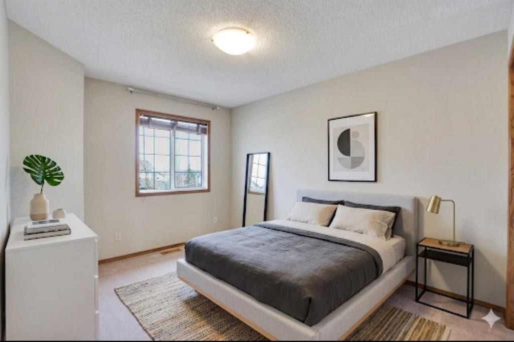 50 Cranfield Crescent Se, Calgary, AB - Indoor Photo Showing Bedroom