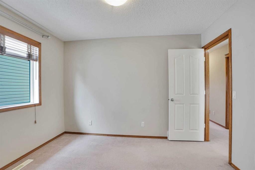 50 Cranfield Crescent Se, Calgary, AB - Indoor Photo Showing Other Room
