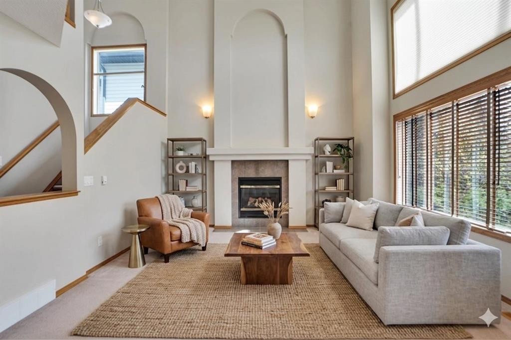 50 Cranfield Crescent Se, Calgary, AB - Indoor Photo Showing Living Room With Fireplace