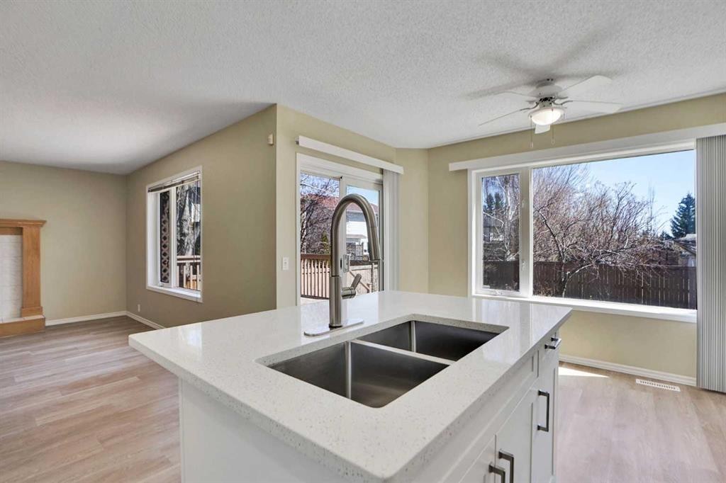 6 Somerset Close Sw, Calgary, AB - Indoor Photo Showing Kitchen With Double Sink