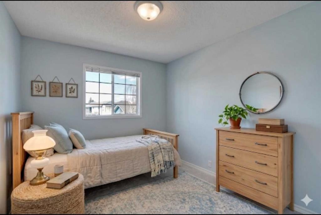 6 Somerset Close Sw, Calgary, AB - Indoor Photo Showing Bedroom