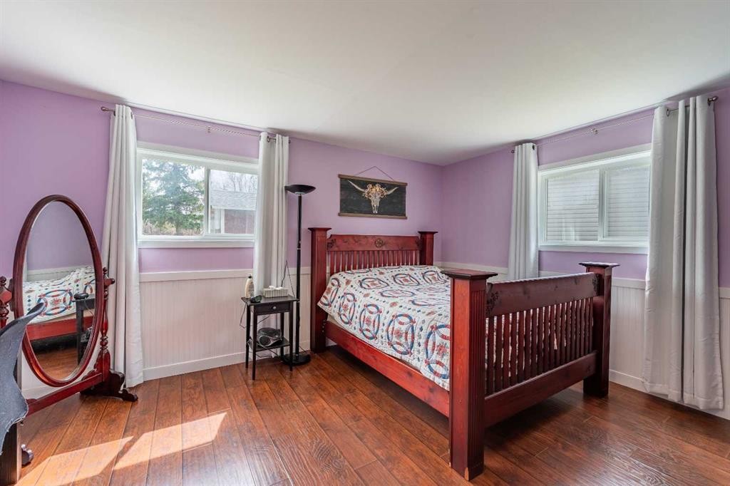 370 16 Avenue, Diamond Valley, AB - Indoor Photo Showing Bedroom