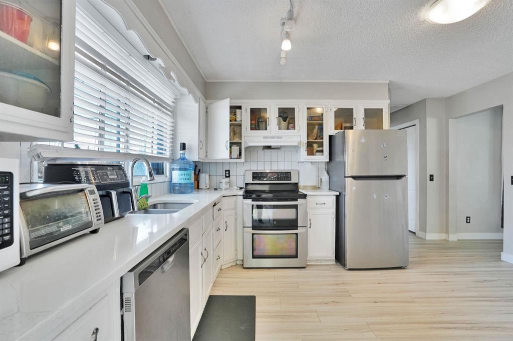 43 Maranda Close Ne, Calgary, AB - Indoor Photo Showing Kitchen With Double Sink