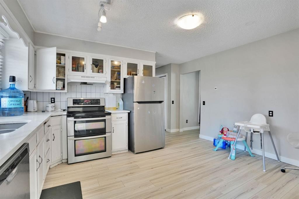 43 Maranda Close Ne, Calgary, AB - Indoor Photo Showing Kitchen With Double Sink