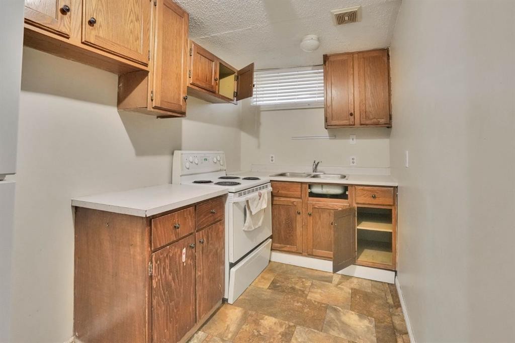 43 Maranda Close Ne, Calgary, AB - Indoor Photo Showing Kitchen With Double Sink