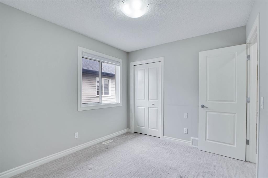 117 Hawkmere Place, Chestermere, AB - Indoor Photo Showing Other Room