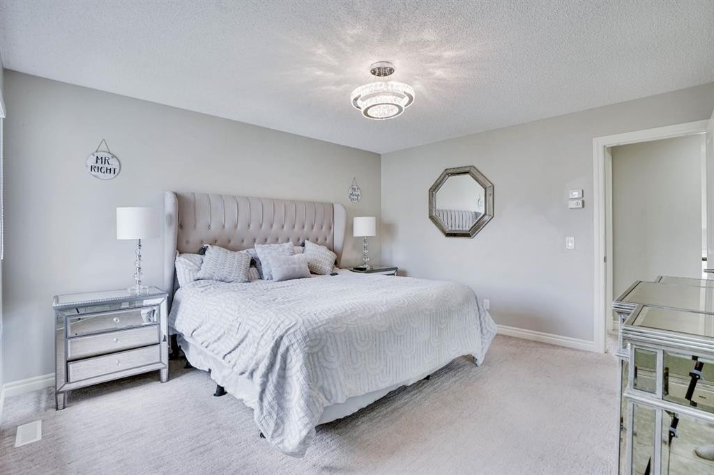 117 Hawkmere Place, Chestermere, AB - Indoor Photo Showing Bedroom
