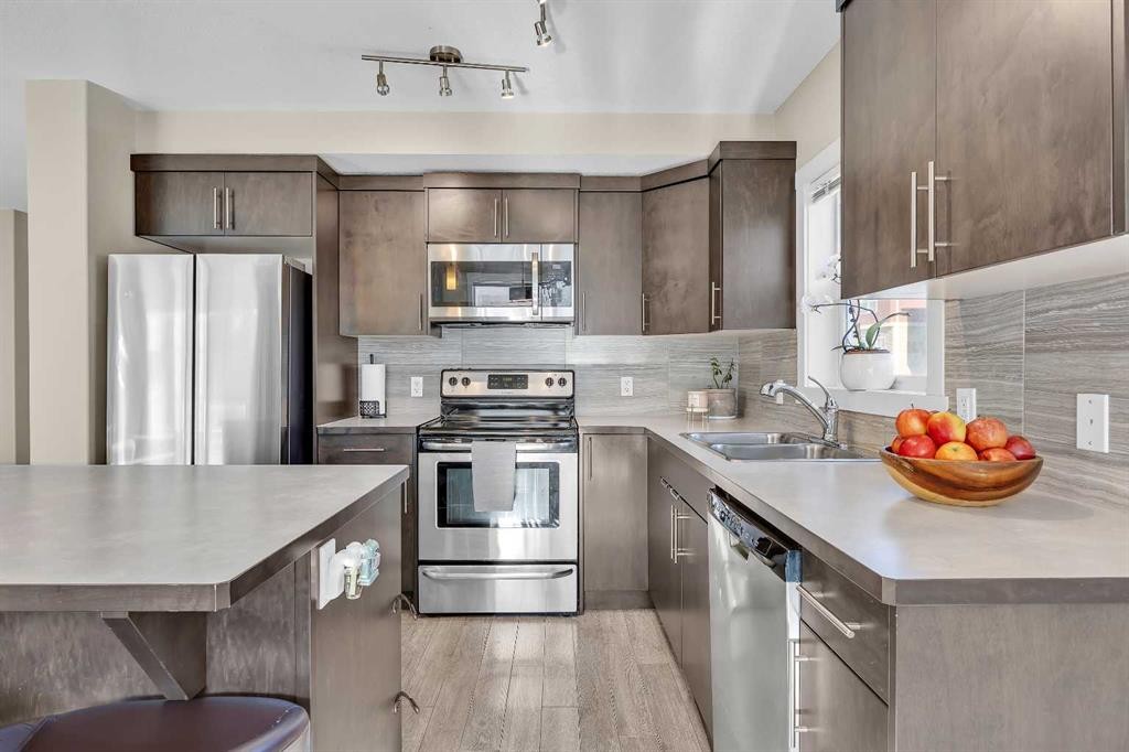 405 Redstone View Ne, Calgary, AB - Indoor Photo Showing Kitchen With Stainless Steel Kitchen With Double Sink