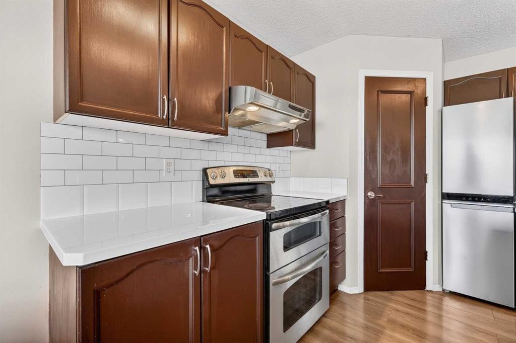 112 Chaparral Circle Se, Calgary, AB - Indoor Photo Showing Kitchen With Stainless Steel Kitchen
