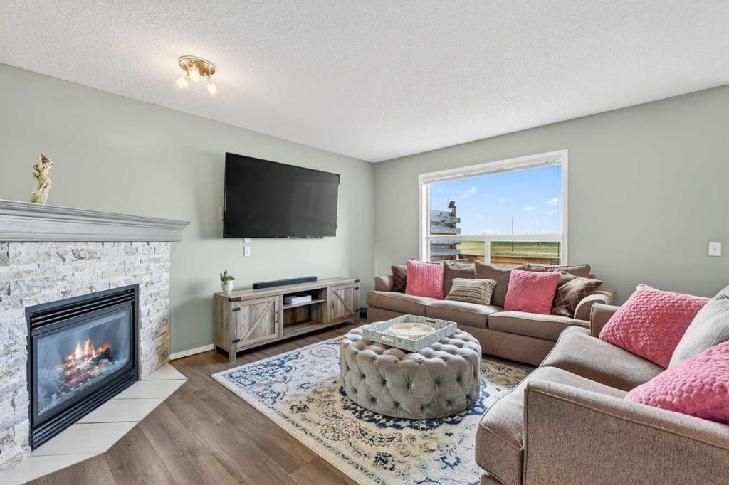 112 Chaparral Circle Se, Calgary, AB - Indoor Photo Showing Living Room With Fireplace