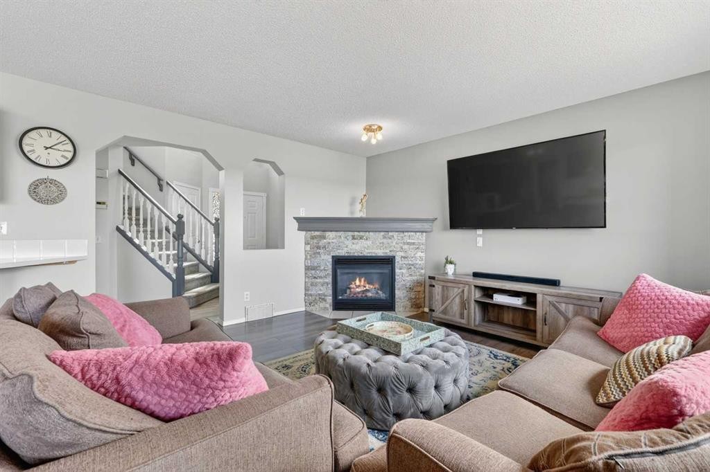 112 Chaparral Circle Se, Calgary, AB - Indoor Photo Showing Living Room With Fireplace