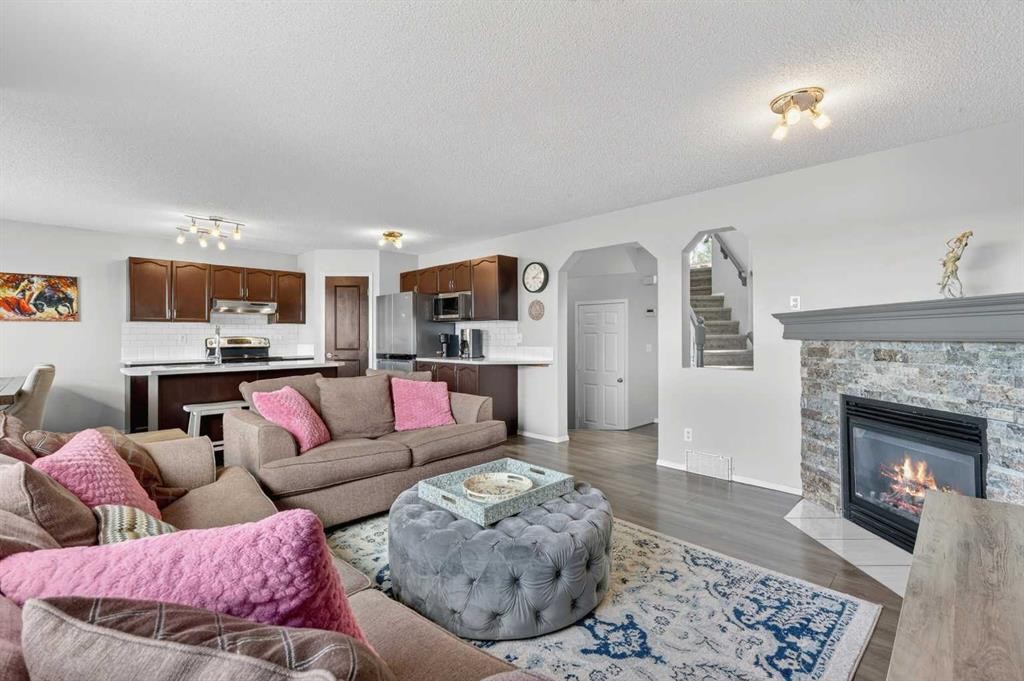 112 Chaparral Circle Se, Calgary, AB - Indoor Photo Showing Living Room With Fireplace