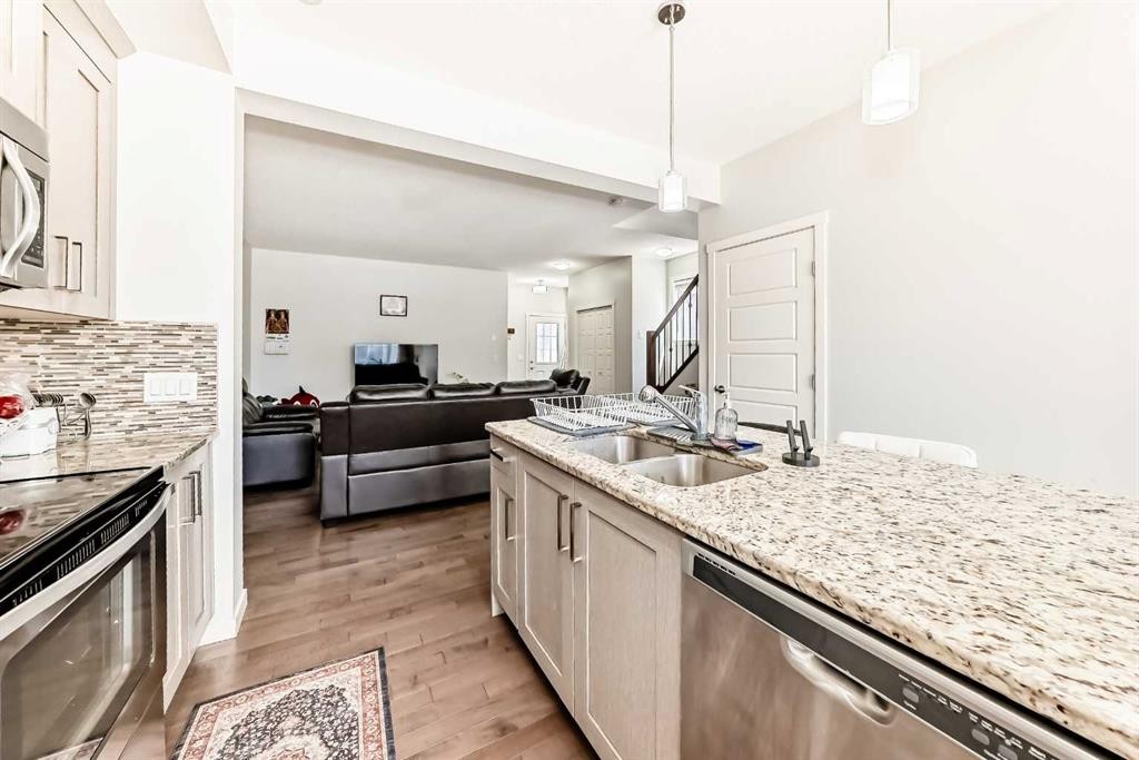 102 Saddlelake Terrace Ne, Calgary, AB - Indoor Photo Showing Kitchen With Stainless Steel Kitchen With Double Sink With Upgraded Kitchen