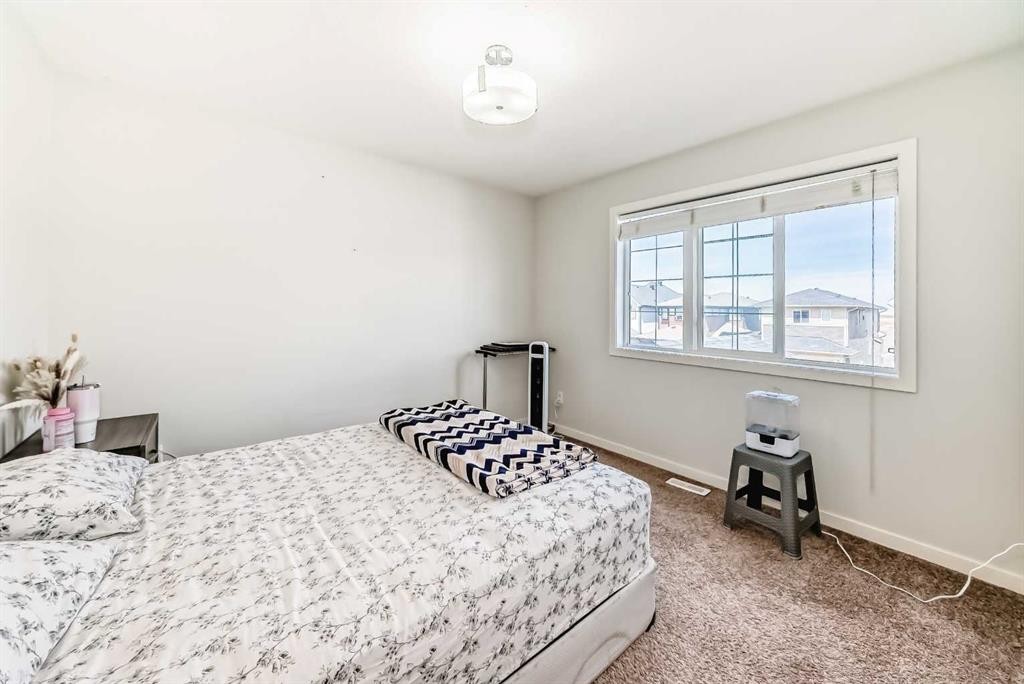 102 Saddlelake Terrace Ne, Calgary, AB - Indoor Photo Showing Bedroom