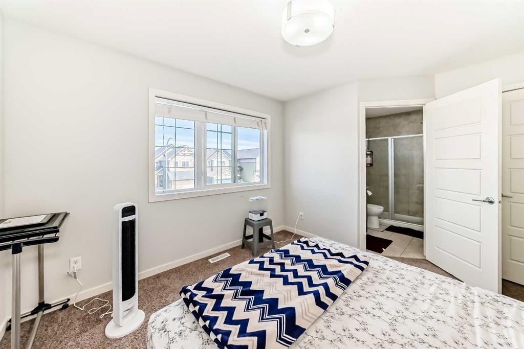 102 Saddlelake Terrace Ne, Calgary, AB - Indoor Photo Showing Bedroom