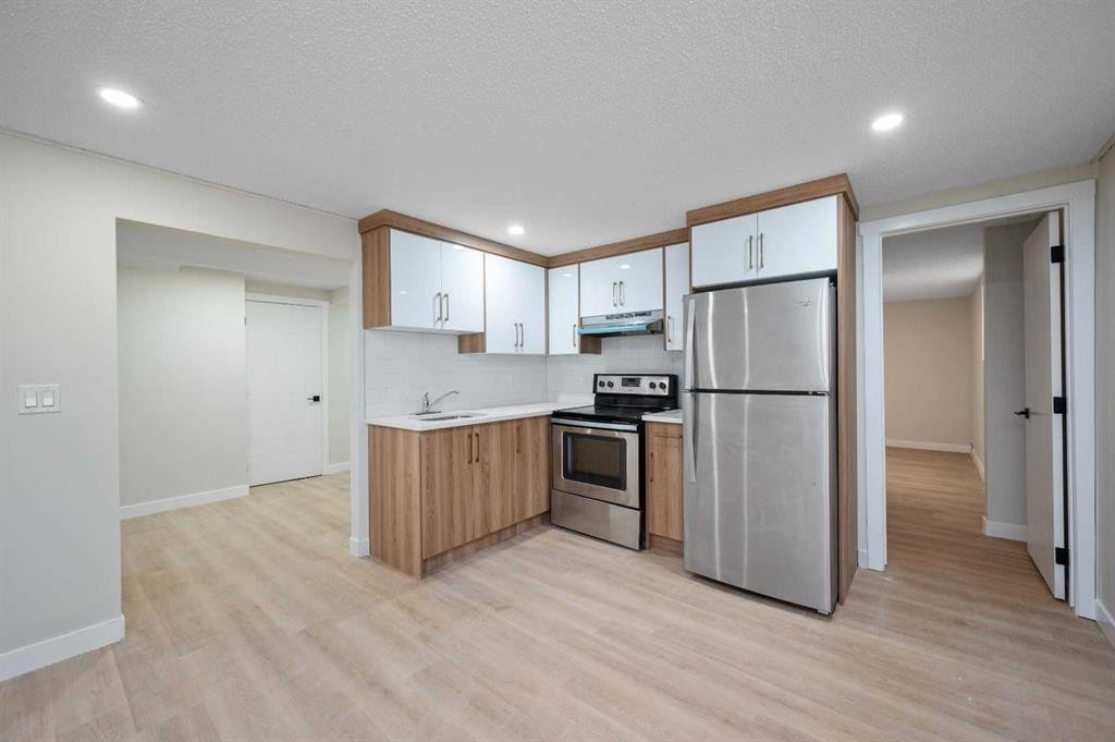 5023 Marlborough Drive Ne, Calgary, AB - Indoor Photo Showing Kitchen With Stainless Steel Kitchen