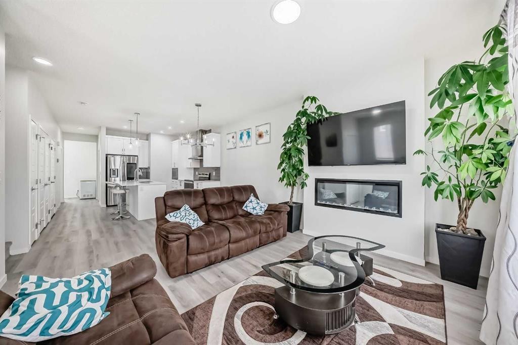 332 Dawson Drive, Chestermere, AB - Indoor Photo Showing Living Room With Fireplace