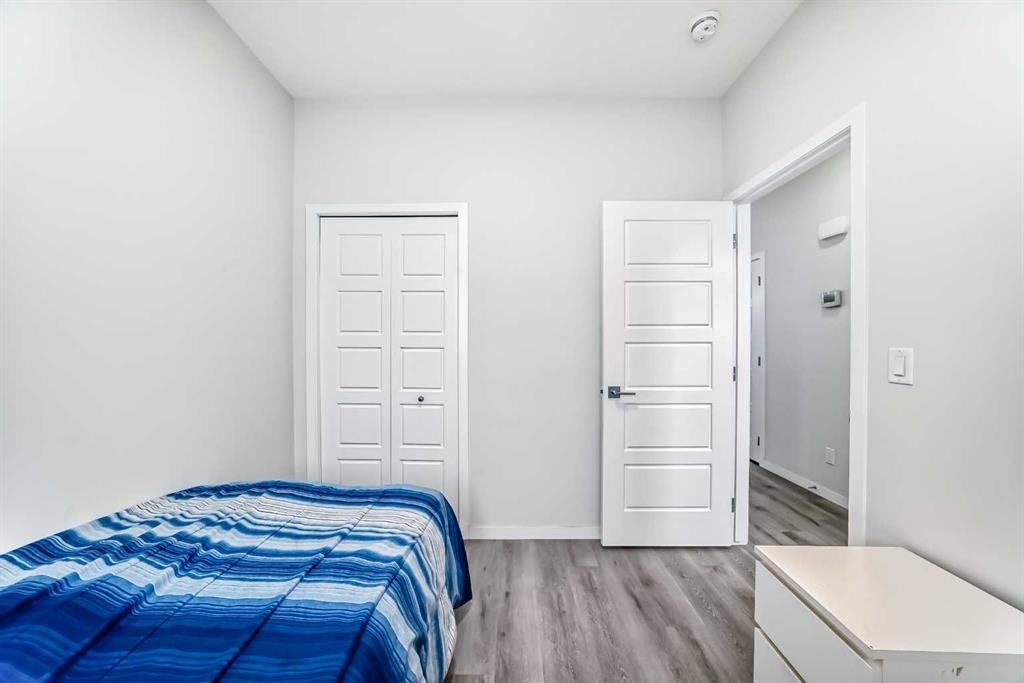 332 Dawson Drive, Chestermere, AB - Indoor Photo Showing Bedroom