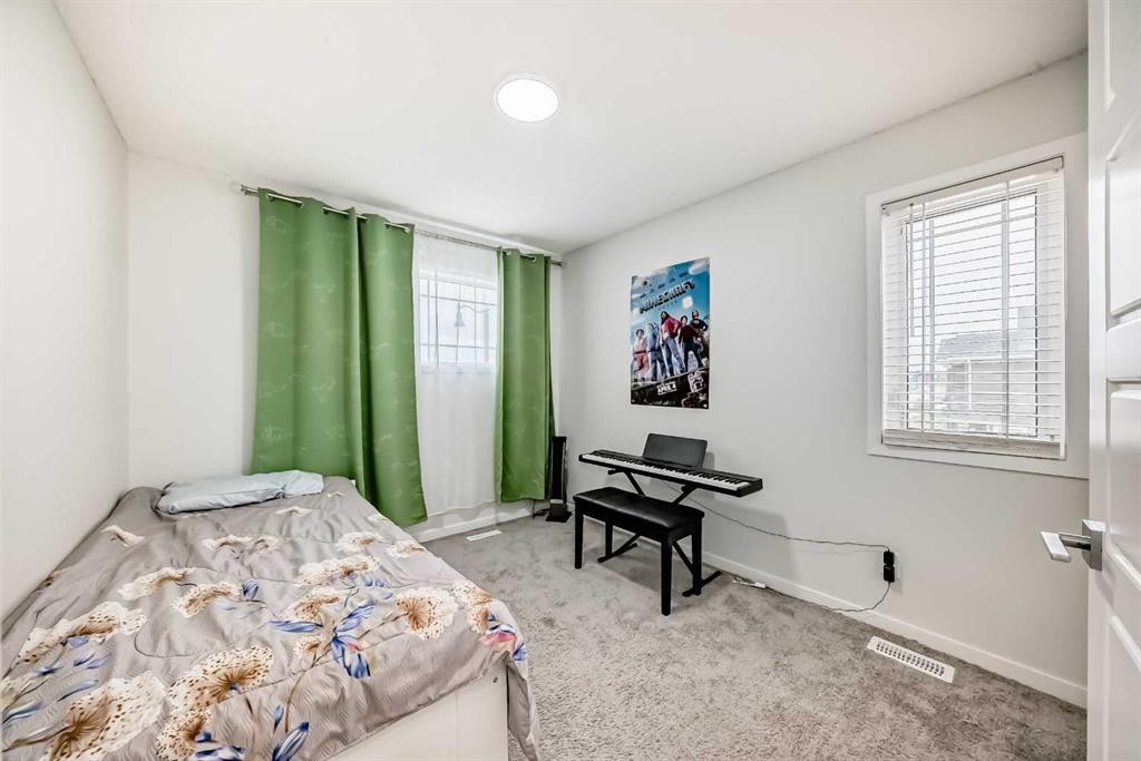332 Dawson Drive, Chestermere, AB - Indoor Photo Showing Bedroom
