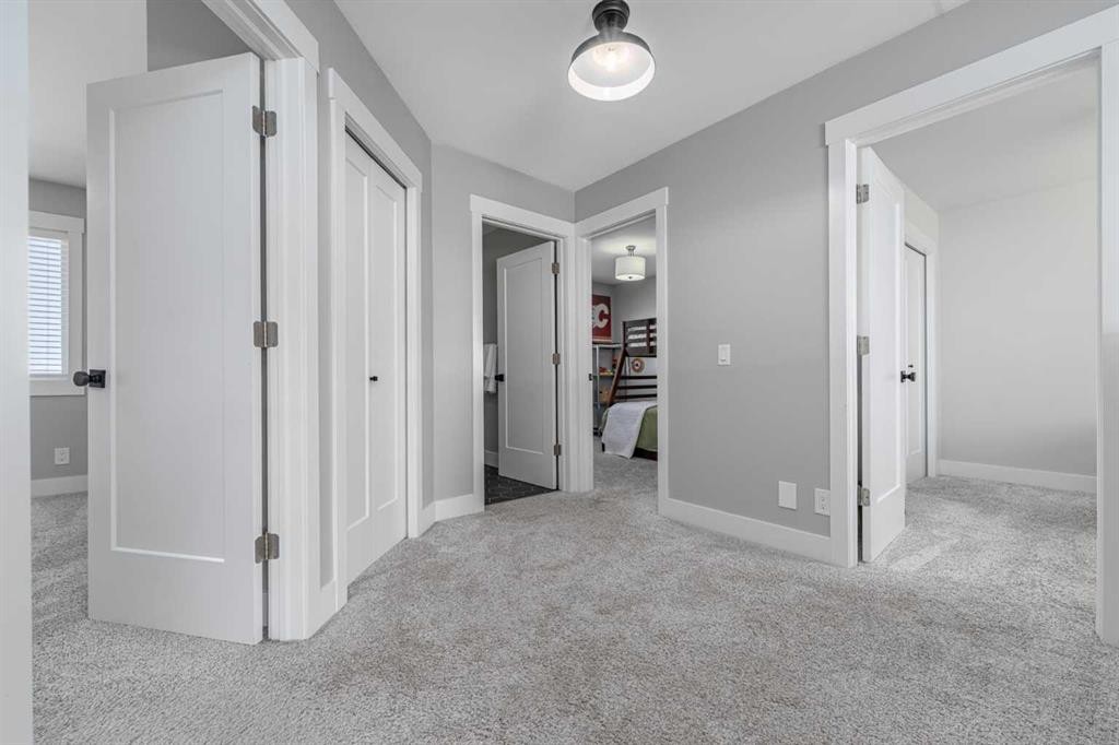 8 Sheep River Hill, Okotoks, AB - Indoor Photo Showing Other Room