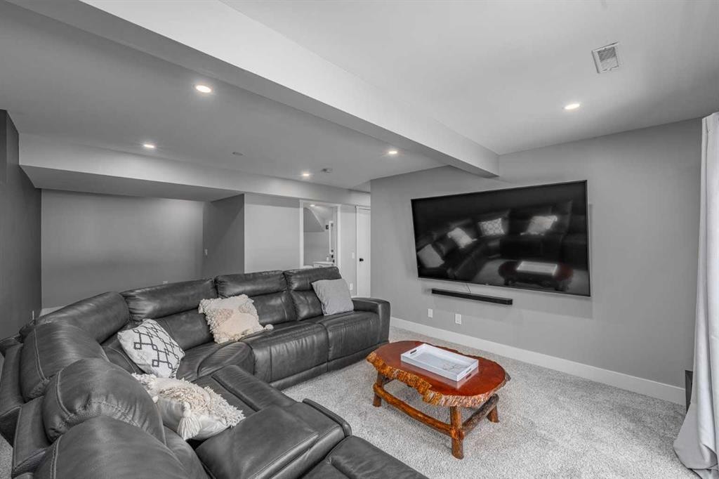 8 Sheep River Hill, Okotoks, AB - Indoor Photo Showing Living Room