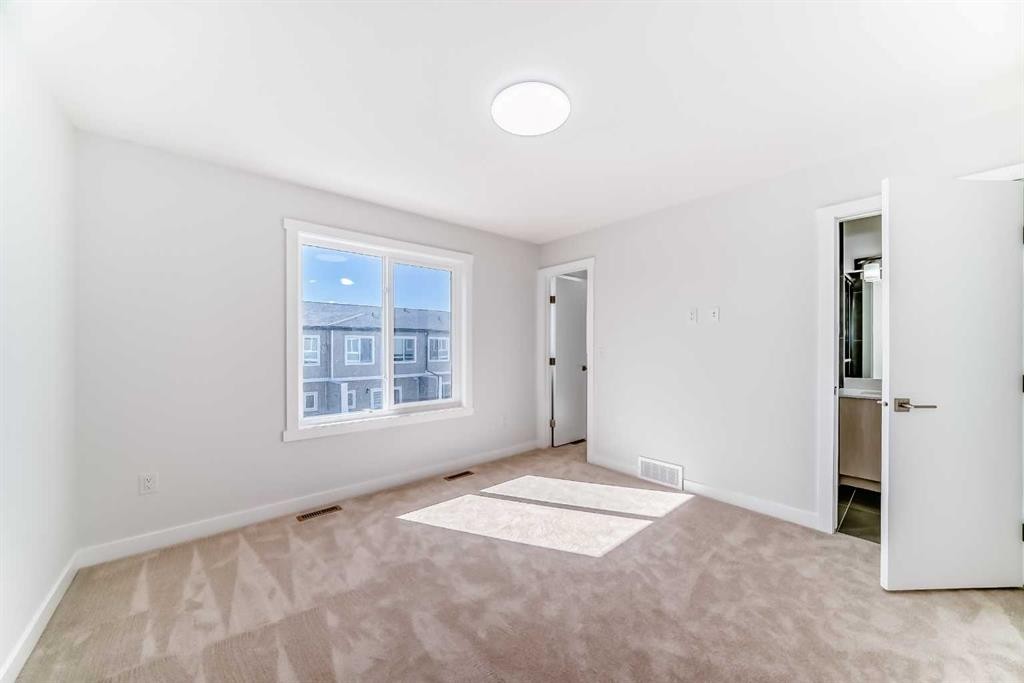 21 Cornergate Place Ne, Calgary, AB - Indoor Photo Showing Other Room