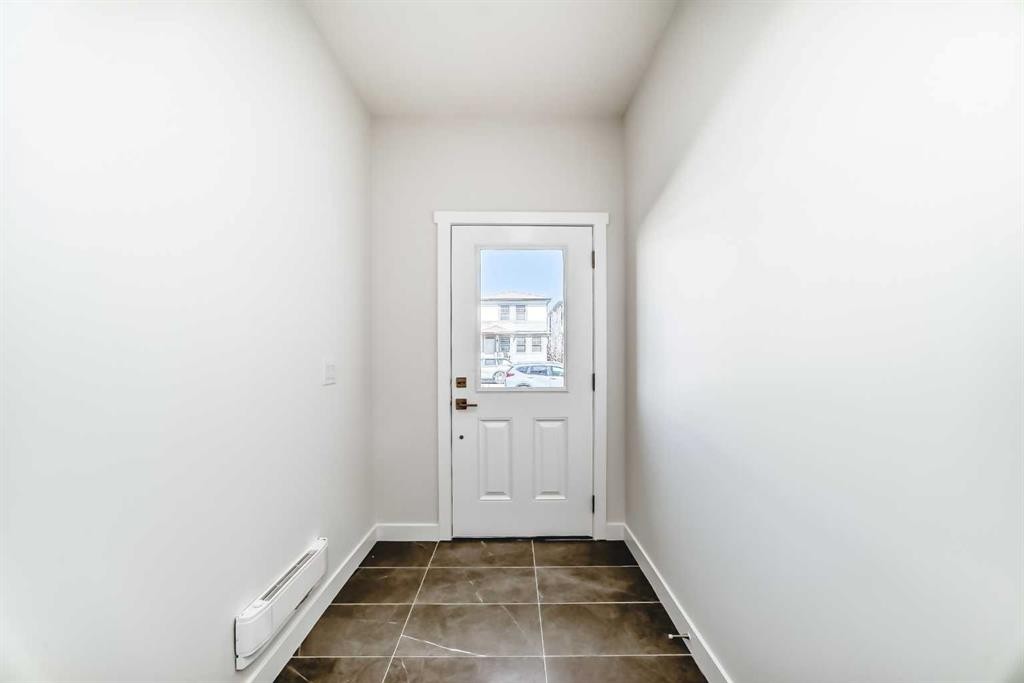 21 Cornergate Place Ne, Calgary, AB - Indoor Photo Showing Other Room