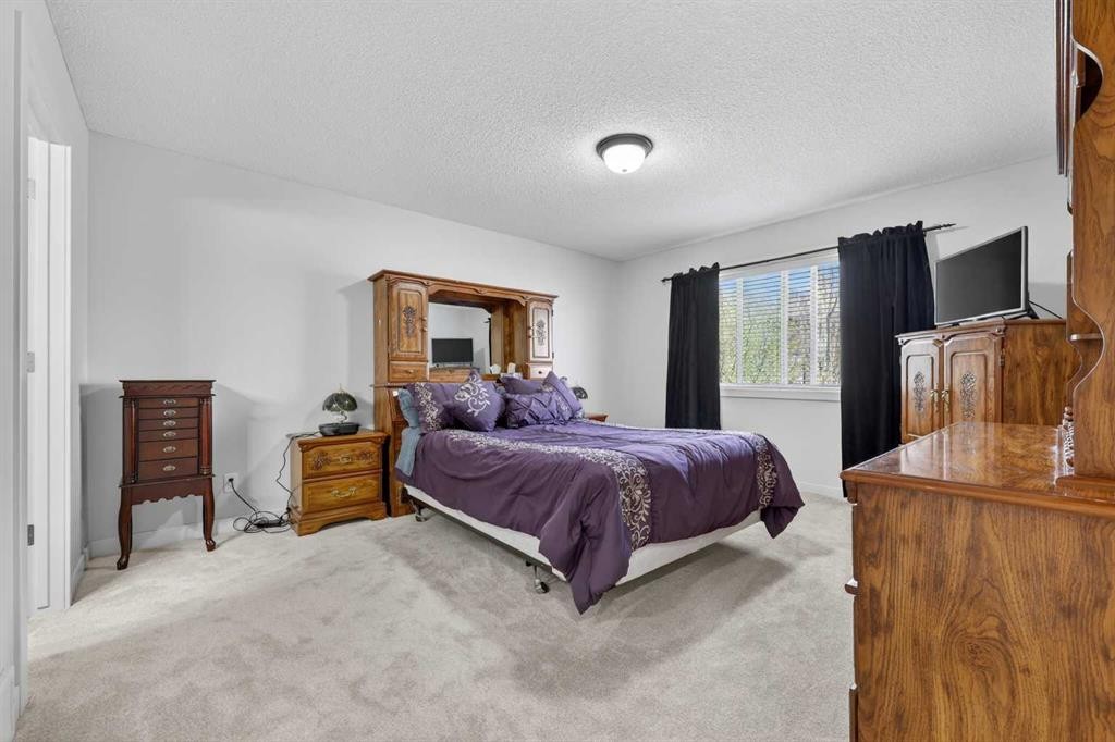 64 Cranridge Crescent Se, Calgary, AB - Indoor Photo Showing Bedroom