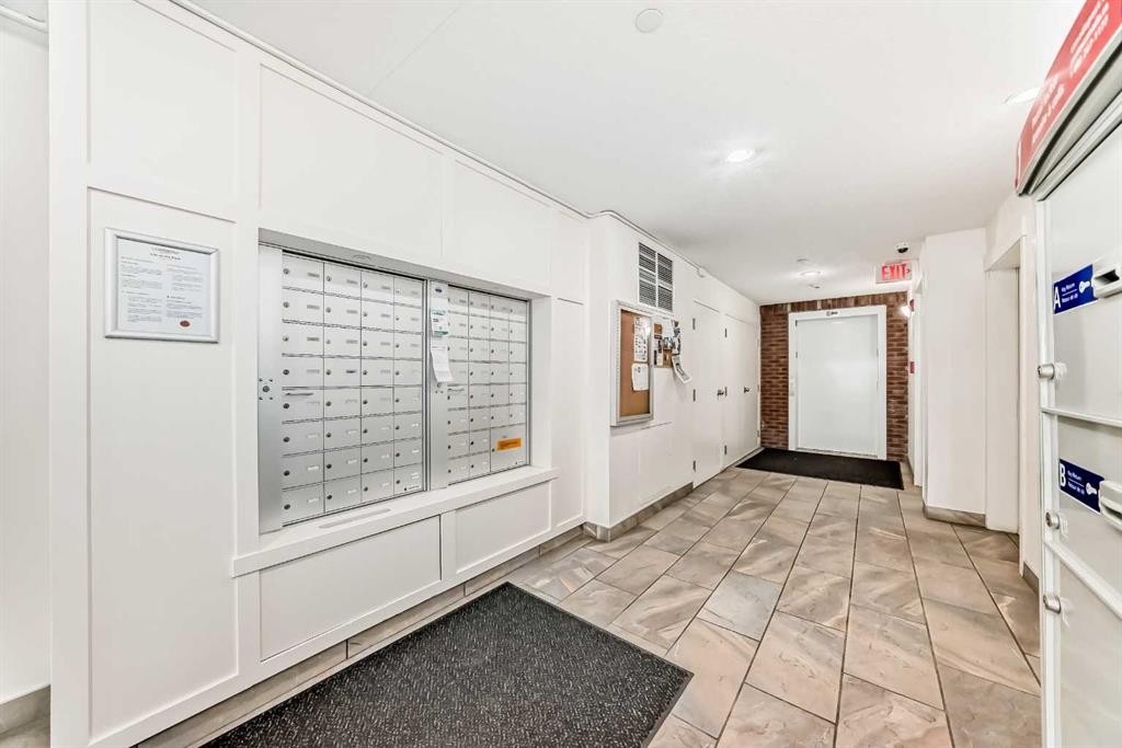 1312-755 Copperpond Boulevard Se, Calgary, AB - Indoor Photo Showing Other Room