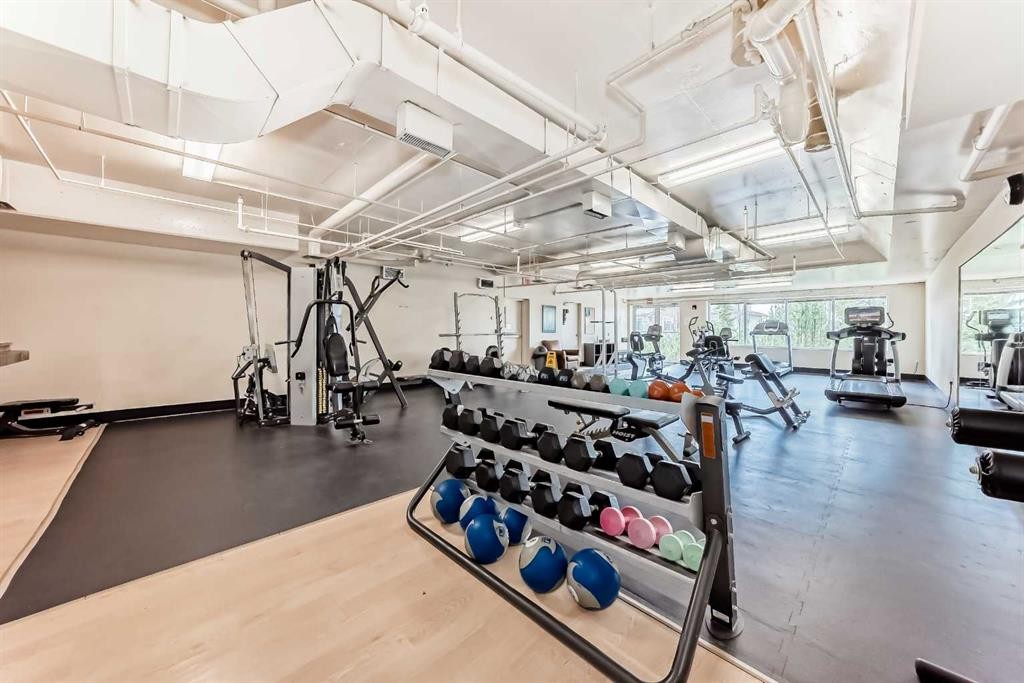 2-132 Rockyledge View Nw, Calgary, AB - Indoor Photo Showing Gym Room