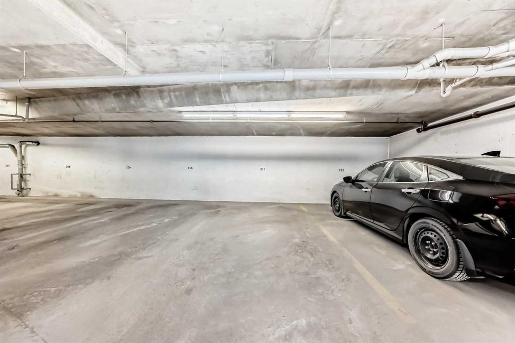 2-132 Rockyledge View Nw, Calgary, AB - Indoor Photo Showing Garage