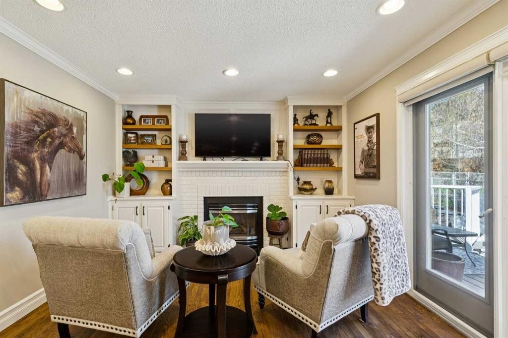 256 Sirocco Place Sw, Calgary, AB - Indoor With Fireplace